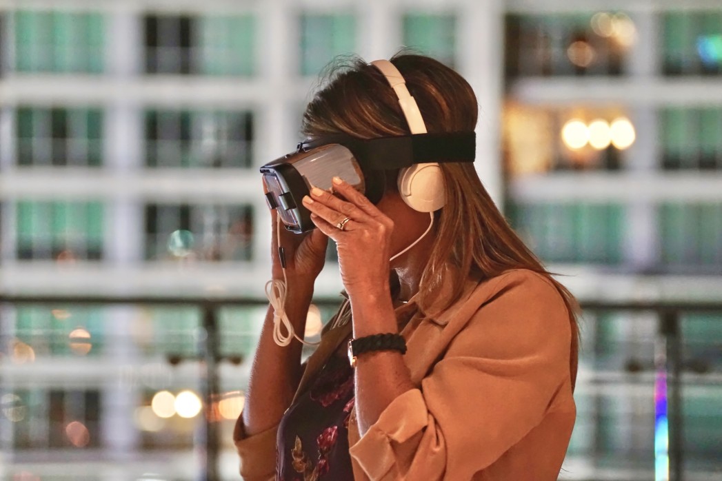 Lady using a VR headset.